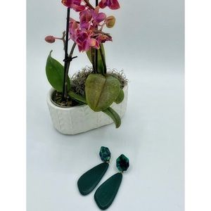 Handmade green dangling earrings.